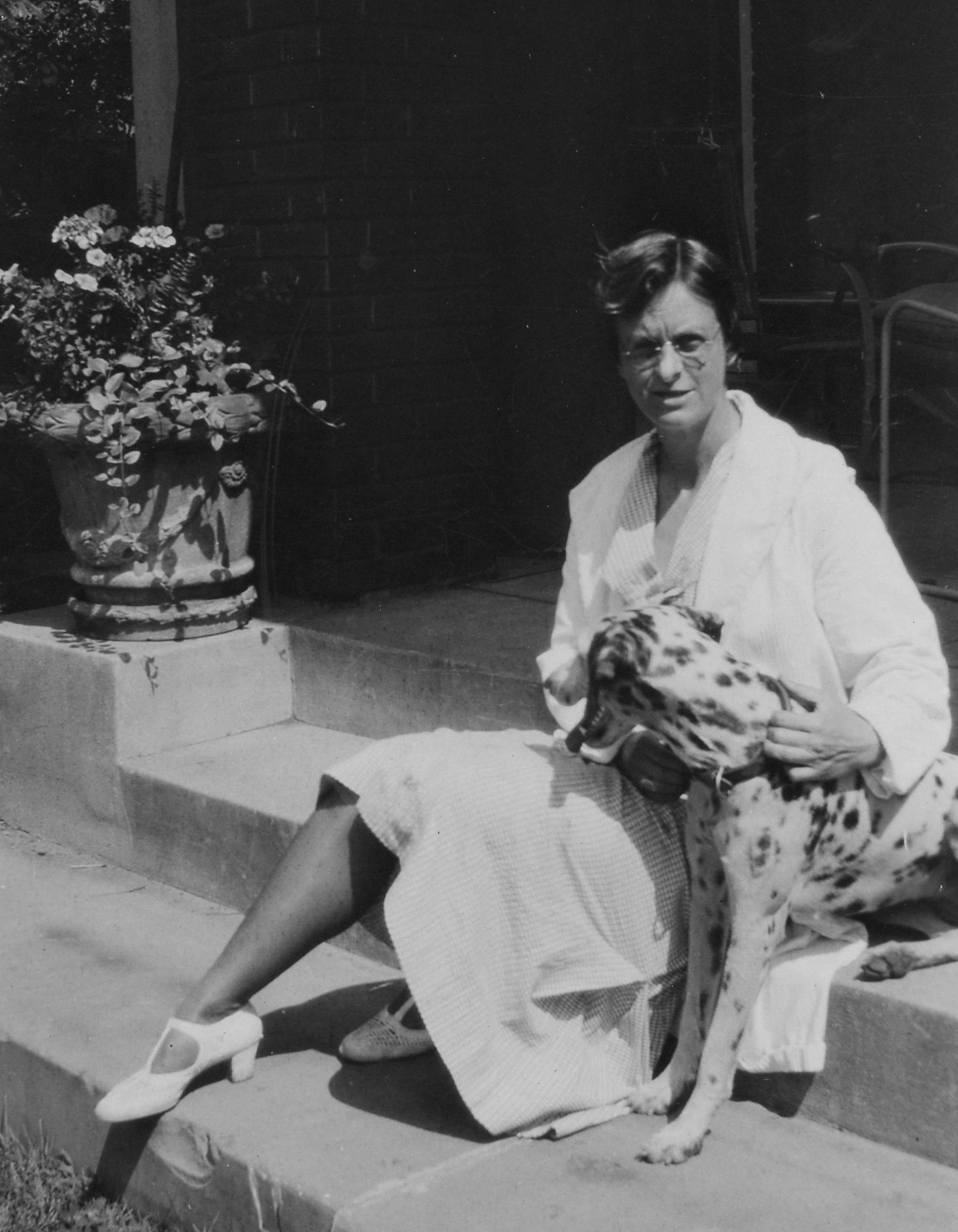 An unknown woman and an unknown dalmation (perhaps Atarah’s husband?) sunning in the courtyard of the Jerusalem School.