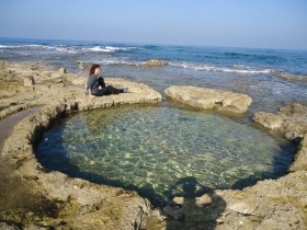 Rock cut pool for keeping murex shells intended for the purple dye industry in Shiqmona (E.G.).